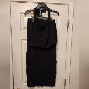2 Piece Set. Halter Top w/tie at the neck. 33in Pull on Skirt. Elastic Waist.